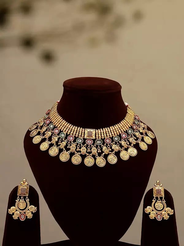 exotic india Stone Studded Brass Necklace Set with Earrings 