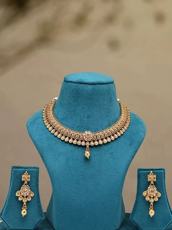 exotic india Stone Studded Brass Necklace with Earrigns 