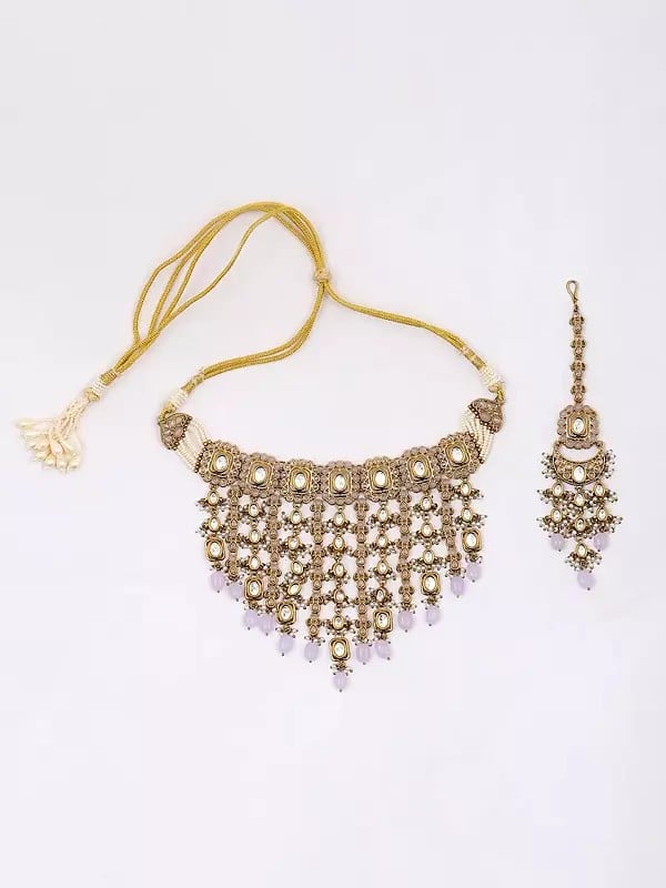 Exotic India Stone Studded Choker Necklace Set With Earrings And Mangtika 