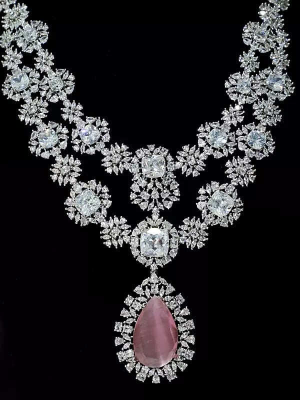 Exotic India Stone Studded Floral Design American Diamond Necklace Set With Earrings