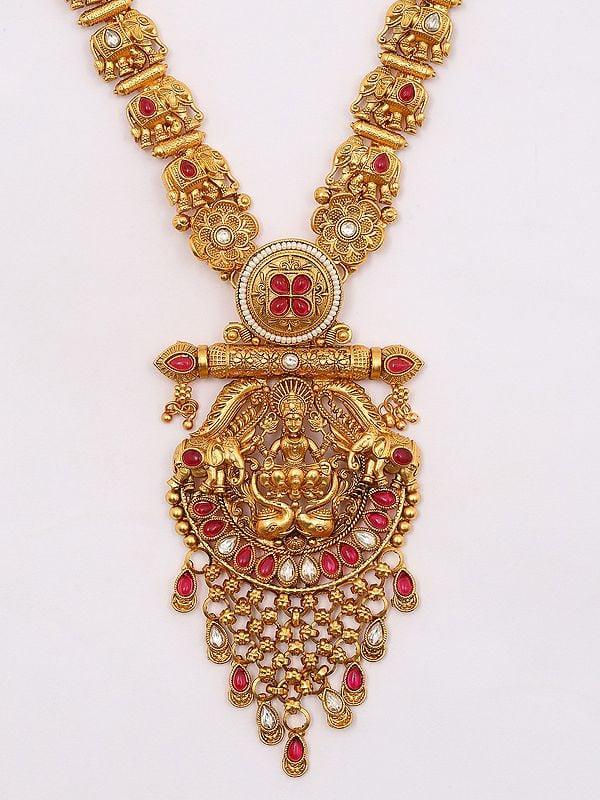 Exotic India Stone Studded Goddess Gajalakshmi Long Necklace Set With Earrings