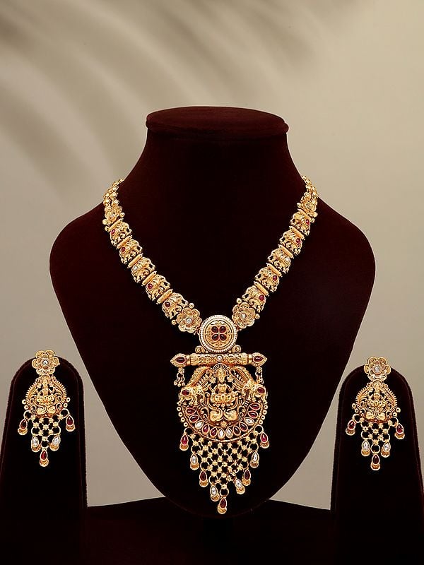 exotic india Stone Studded Goddess Gajalakshmi long Necklace Set with Earrings 