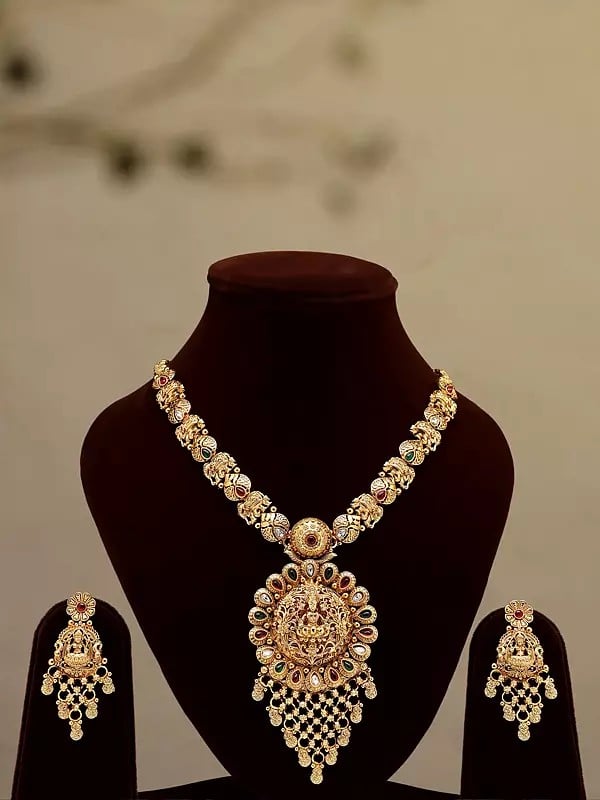exotic india Stone Studded Goddess Lakshmi long Necklace Set with Earrings 