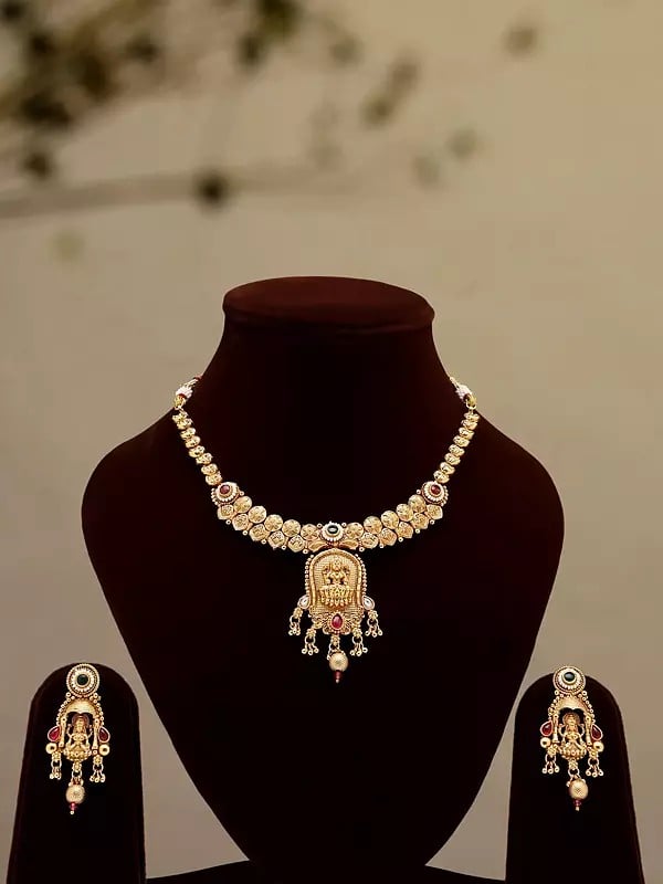 exotic india Stone Studded Goddess Lakshmi Necklace Set with Earrings 