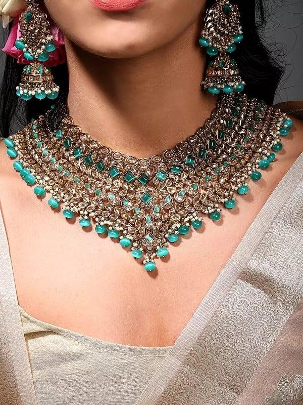 Exotic India Stone Studded Necklace Set With Earrings And Mangtika With Drop Beads
