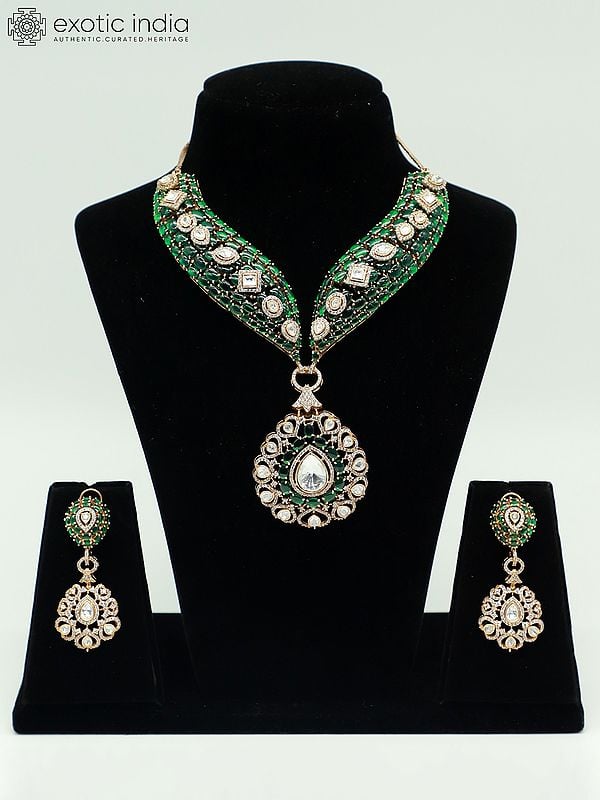 exotic india Stunning Moissanite Kundan With Matt Polish Stone Studded Necklace With Teardrop Earrings