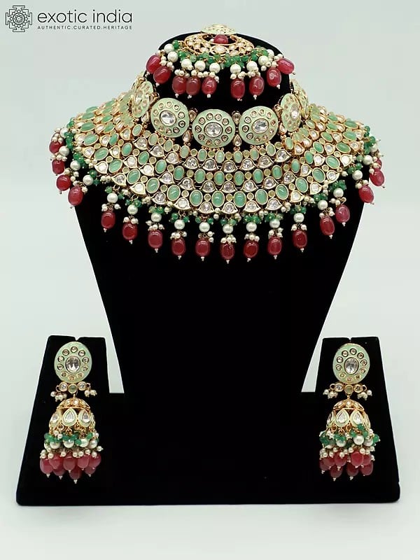 exotic india Stunning Stone Studded And Beaded Embellished Choker Necklace With Earrings And Mangtika
