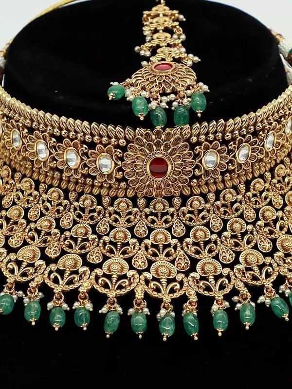 Exotic India Stunning Stone Studded Heavy Choker Necklace With Matching Earrings And Mangtika