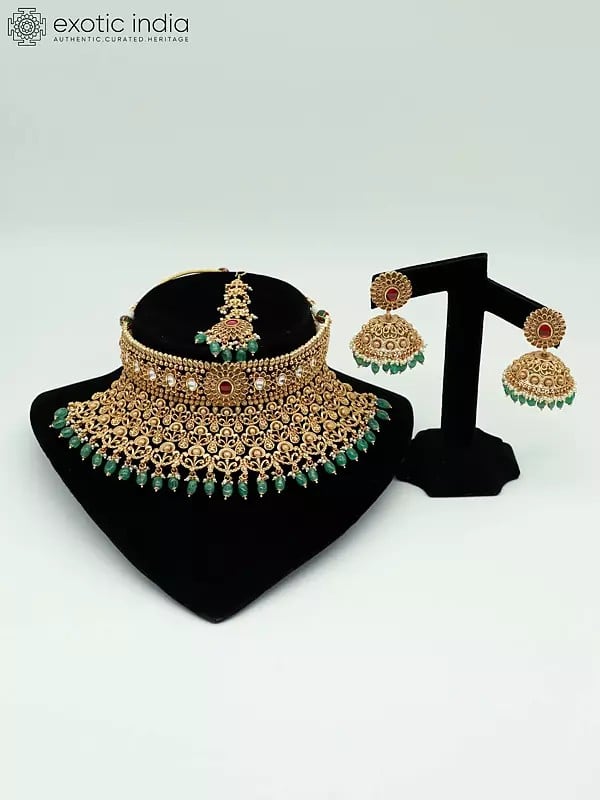 exotic india Stunning Stone Studded Heavy Choker Necklace With Matching Earrings And Mangtika 