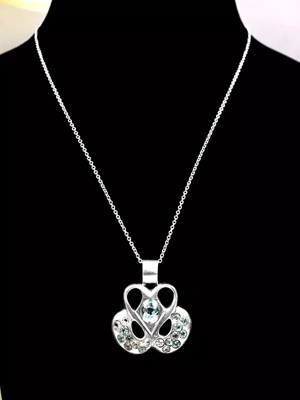 Exotic India Stylish Sterling Silver Pendant With Blue Topaz And Crystal Stone