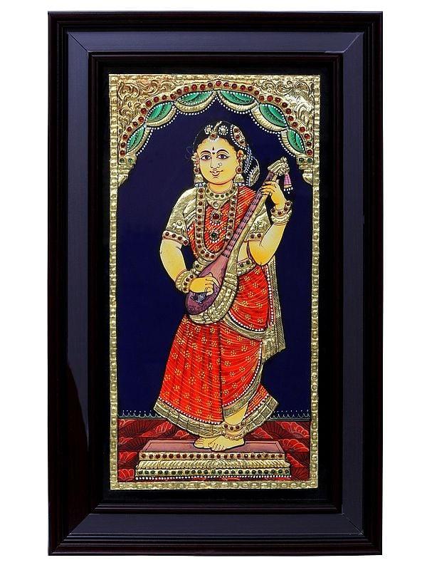 exotic india Tanjore Painting of Female Musician with Veena | Traditional Colors with 24 Karat Gold | With Frame