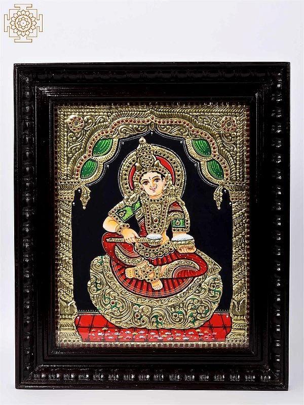 exotic india Tanjore Painting of Goddess Annapoorna Devi | Traditional Colors with 24 Karat Gold | With Frame