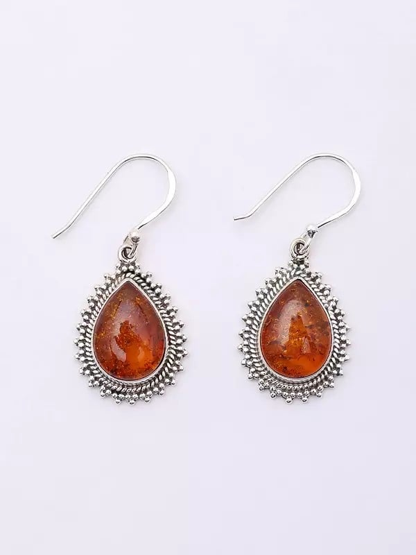Exotic India Teardrop Shaped Cabochon Baltic Amber Earrings 