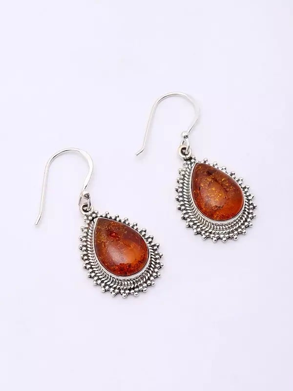 Exotic India Teardrop Shaped Cabochon Baltic Amber Earrings 