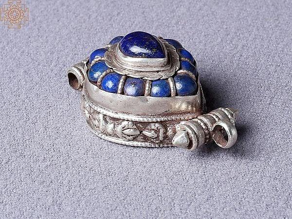 Exotic India Tibetan Ghau Navy Blue Pendant | Sterling Silver Jewelry From Nepal