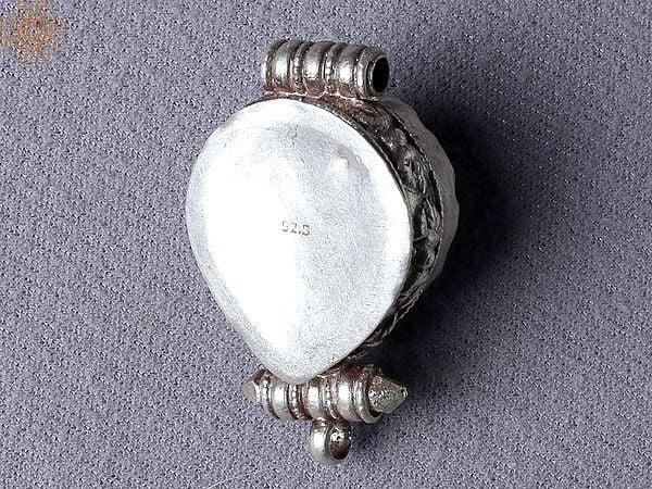 Exotic India Tibetan Ghau Navy Blue Pendant | Sterling Silver Jewelry From Nepal