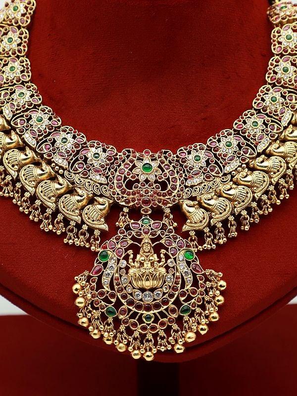 Exotic India Traditional Goddess Lakshmi Stone Studded And Beaded Necklace With Earrings