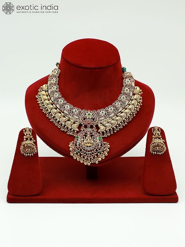 exotic india Traditional Goddess Lakshmi Stone Studded And Beaded Necklace With Earrings 