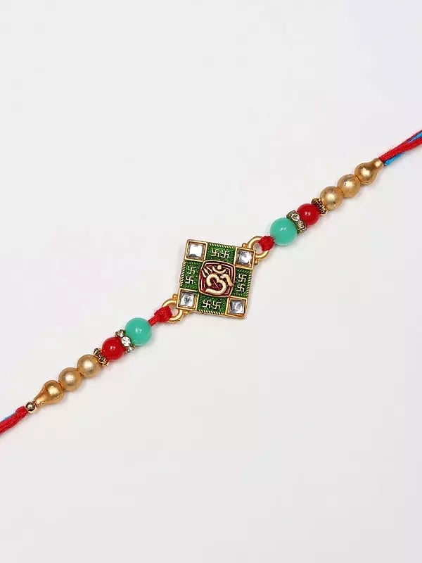 exotic india Traditional Kite Shaped Om Shubh Rakhi 