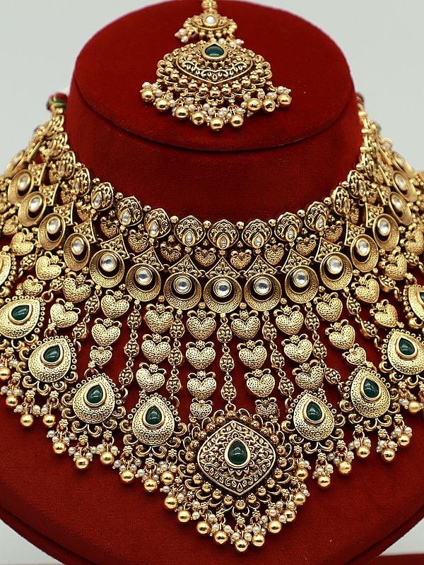 Exotic India Traditional Necklace Set With Intricate Carvings And Beautiful Earrings 