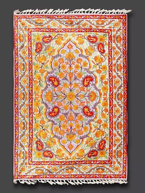 Exotic India Tri-Color Chain Stitched Floral Carpet From Kashmir With Tassels