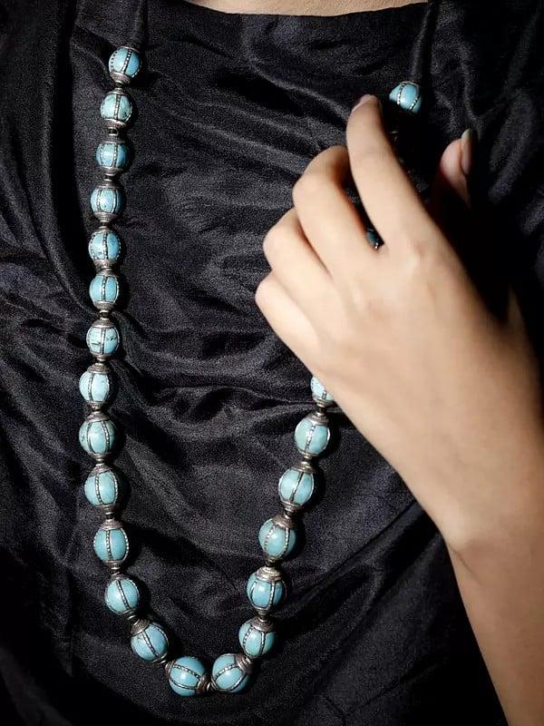 Exotic India Turquoise Beads Necklace With Patterned Silver Border 