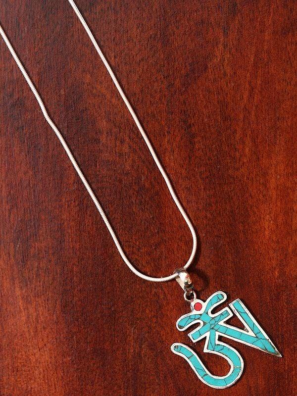 Exotic India Turquoise Colored Tibetan Om (AUM) Inlay Pendant From Nepal 