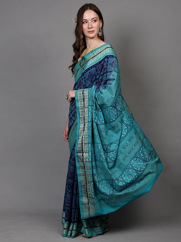 Exotic India Twilight-Blue Pure Cotton Ikat Handloom Saree With Animal Motifs And Fish Weave Border From Sambhalpur 