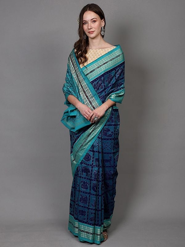 exotic india Twilight-Blue Pure Cotton Ikat Handloom Saree with Animal Motifs and Fish Weave Border from Sambhalpur 