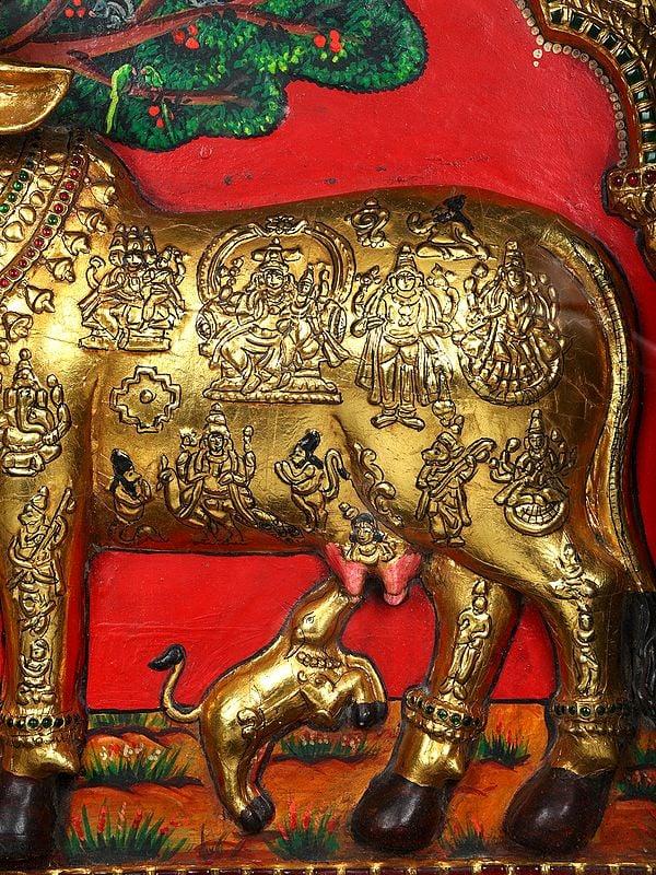 Exotic India Vashista Muni Worshipping Goddess Kamadhenu | Embossed 24 Karat Gold Work | Vintage Framed Tanjore Painting 