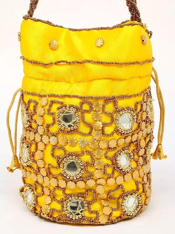 Exotic India Vibrant-Yellow Drawstring Potli Bag With Beads And Mirror Embroidery 