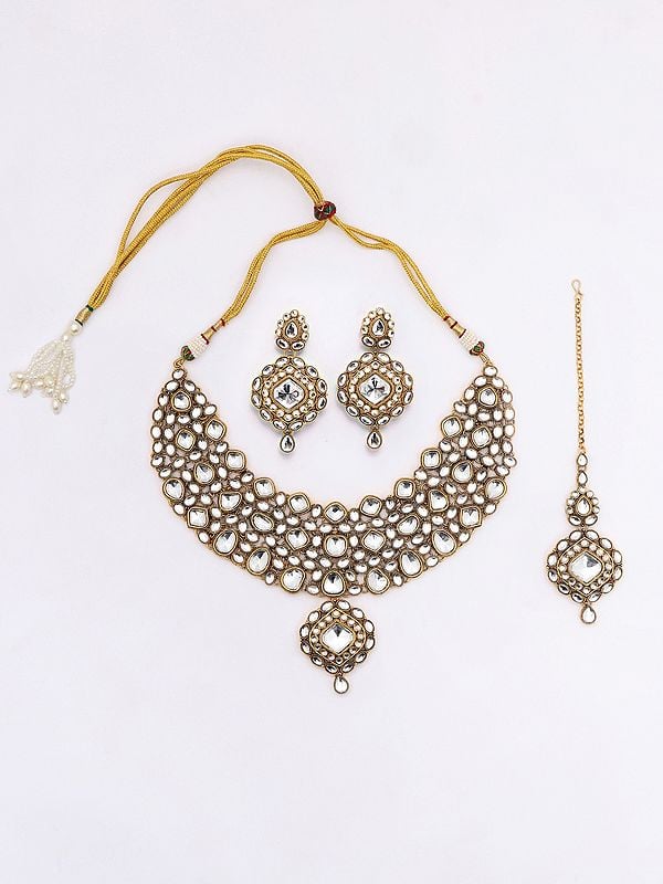 Exotic India White Kundan Studded Necklace With Earrings And Mangtika Set