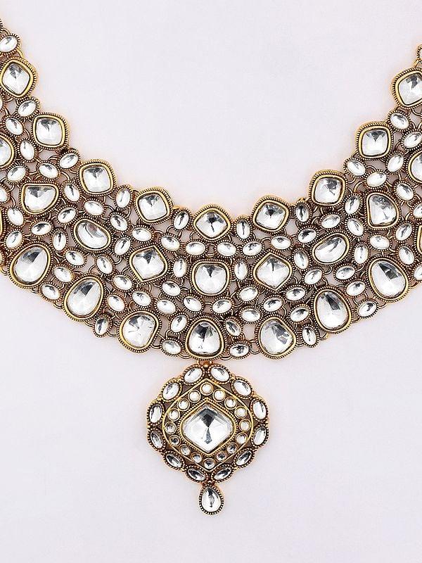 Exotic India White Kundan Studded Necklace With Earrings And Mangtika Set