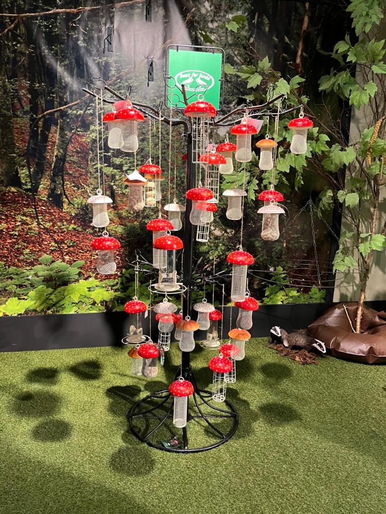 fallen fruits TREE DISPLAY WITH MUSHROOM BIRD FEEDERS