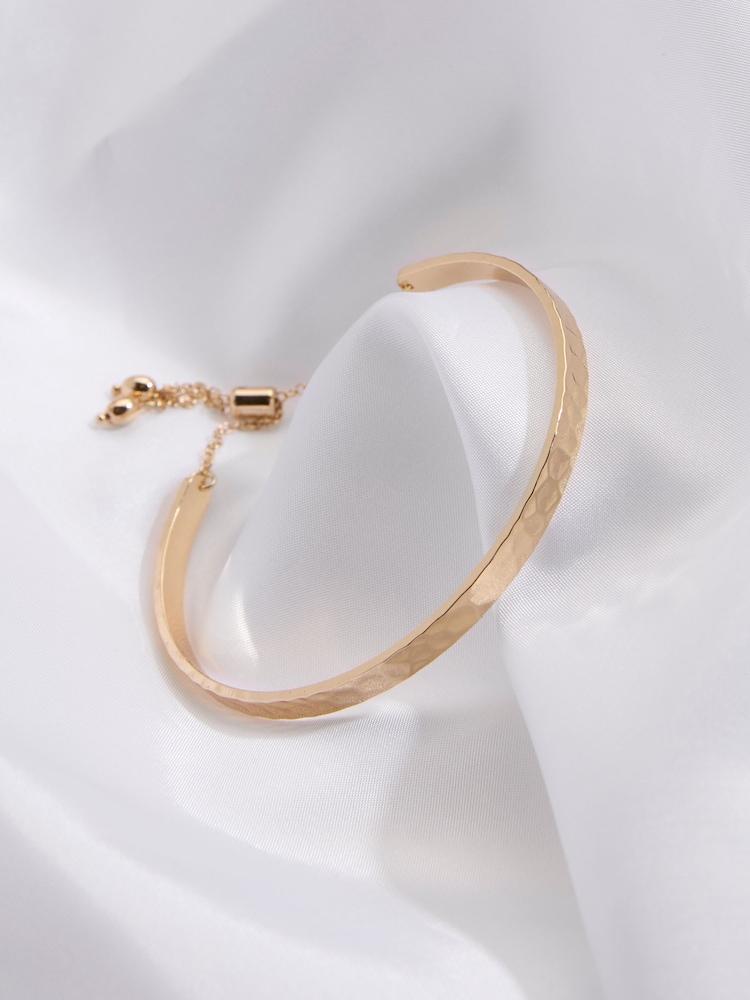 fat face Gold Tone Hammered Bangle