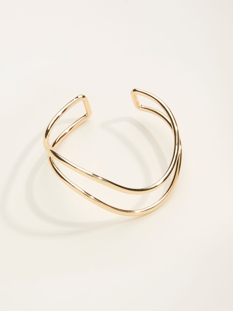 Fat Face Gold Tone Twist Bangle