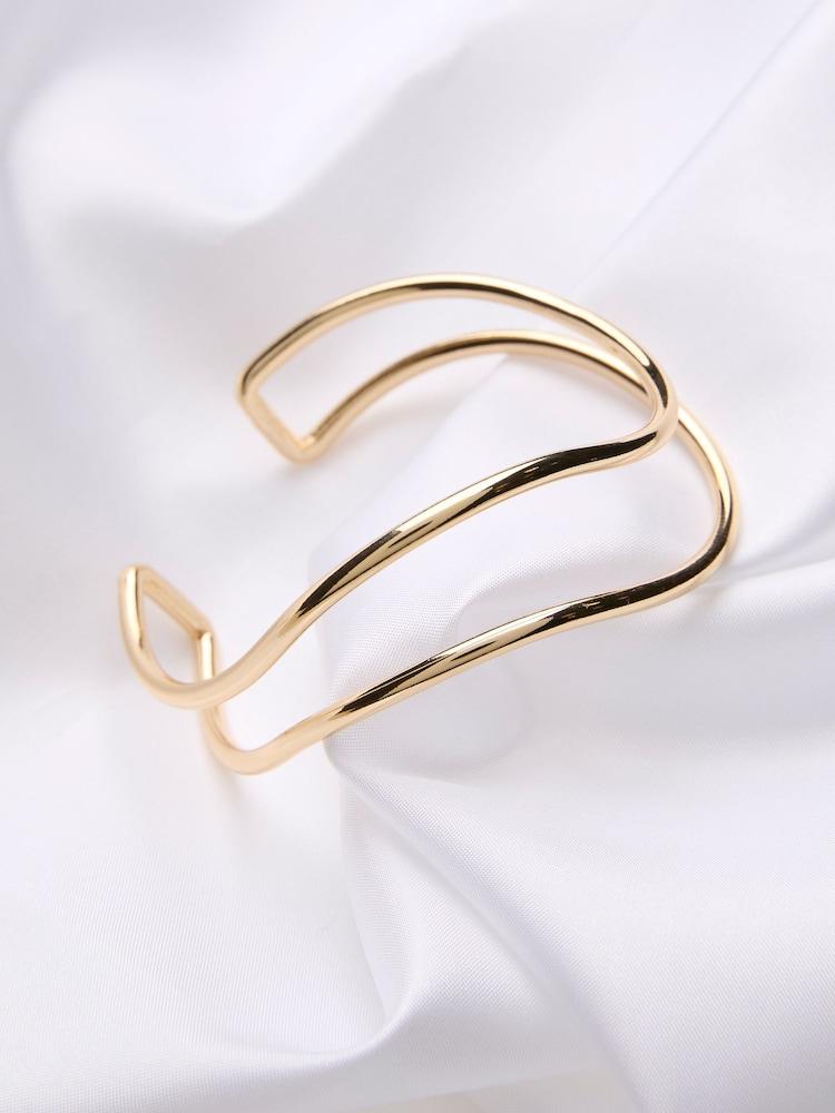 fat face Gold Tone Twist Bangle