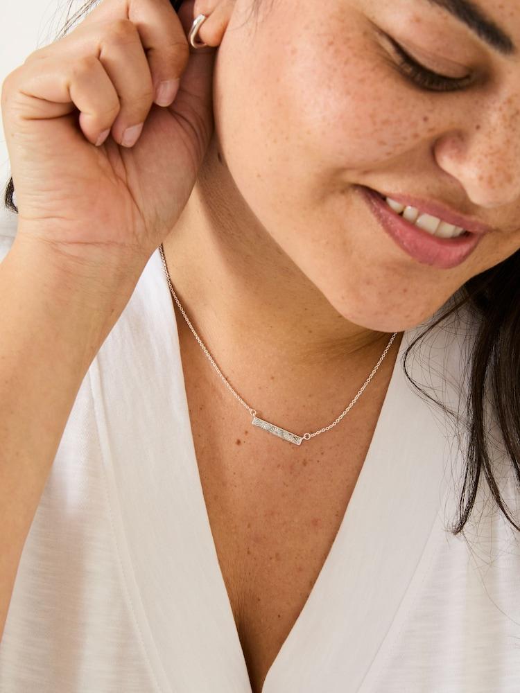 fat face Silver Tone Flower Engraved Necklace