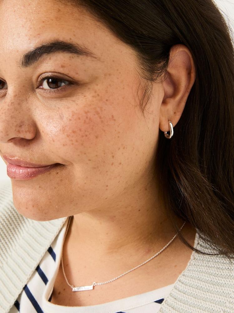 fat face Silver Tone Oval Huggie Hoop Earrings