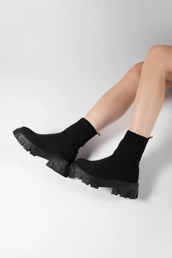 Femme Luxe Black Cleated Pull On Knit Chunky Sole Sock Ankle Boots - Melissa