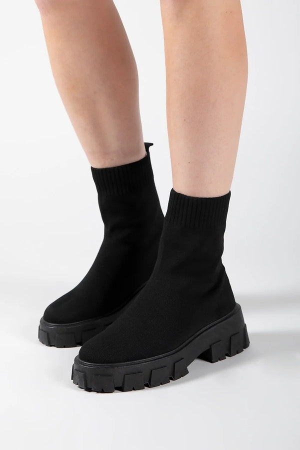 femme luxe Black Cleated Pull On Knit Chunky Sole Sock Ankle Boots - Melissa