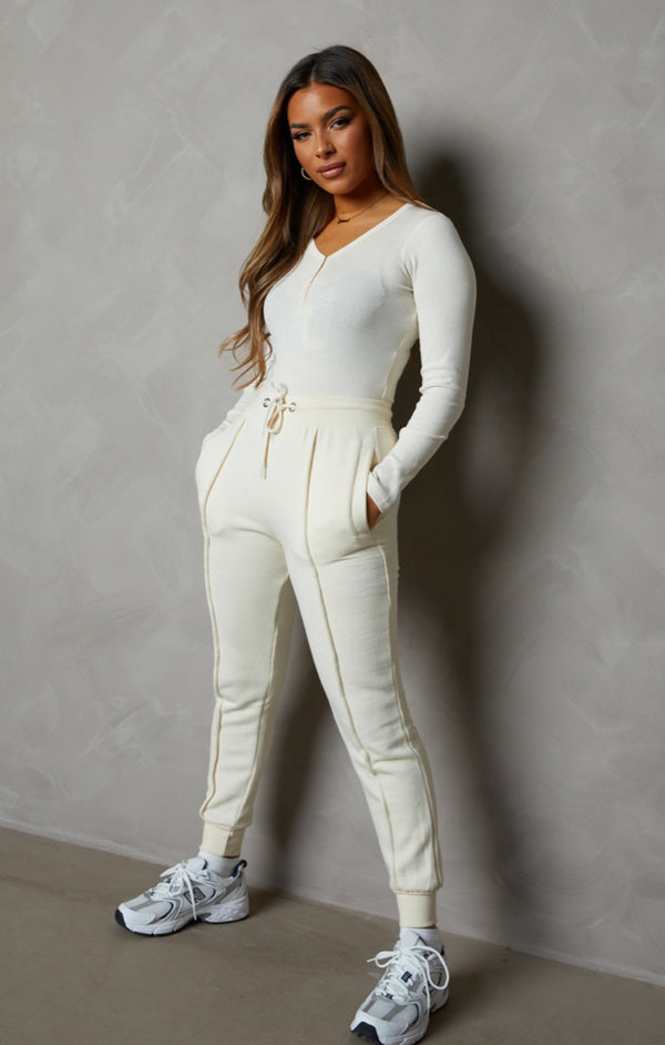 Femme Luxe Cream Ribbed Long Sleeve Popper Front Bodysuit - Aletta
