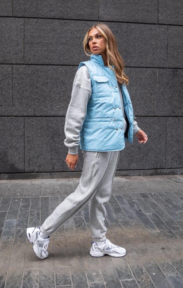 Femme Luxe Light Blue High Neck Sleeveless Popper Front Pocket Detail Padded Gilet - Tinley