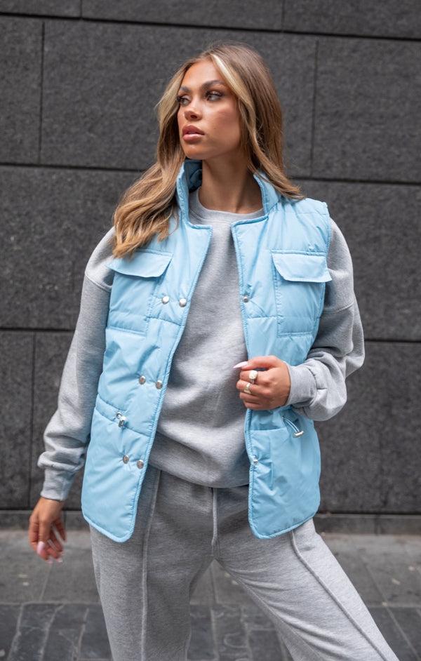 femme luxe Light Blue High Neck Sleeveless Popper Front Pocket Detail Padded Gilet - Tinley