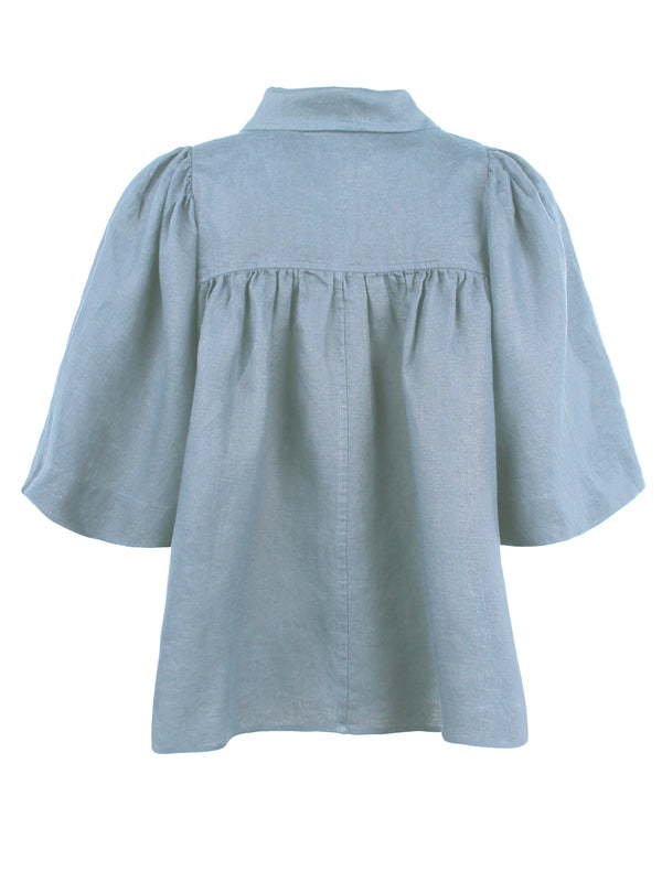 Finley Collin Light Blue Solid Linen Blouse With A An Oversized Shape And Cape Sleeves
