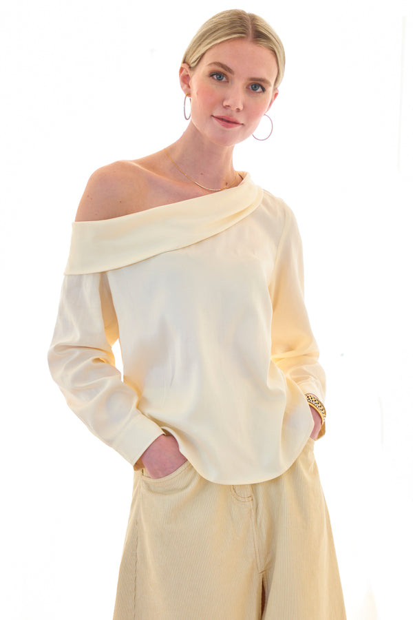 finley Dani Asymmetric popover long sleeve off-shoulder top with a foldover neckline and a relaxed contour