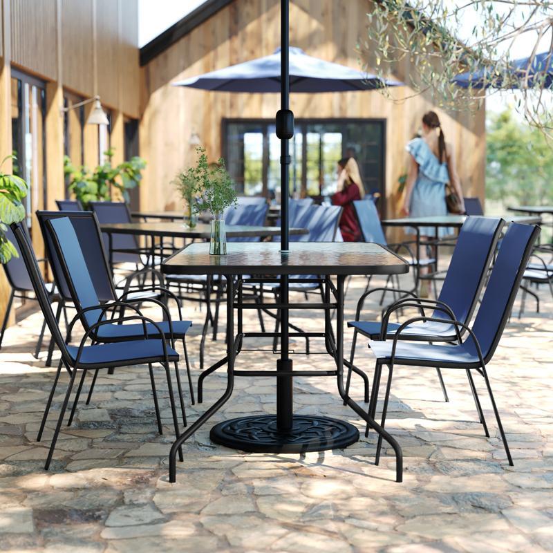 flash furniture Brazos 5 Piece Outdoor Patio Dining Set - 55" Tempered Glass Patio Table with Umbrella Hole 4 Navy Flex Comfort Stack Chairs