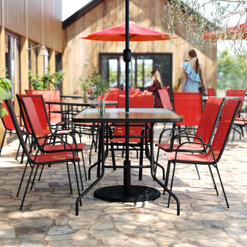 flash furniture Brazos 7 Piece Outdoor Patio Dining Set - 55" Tempered Glass Patio Table with Umbrella Hole 6 Red Flex Comfort Stack Chairs