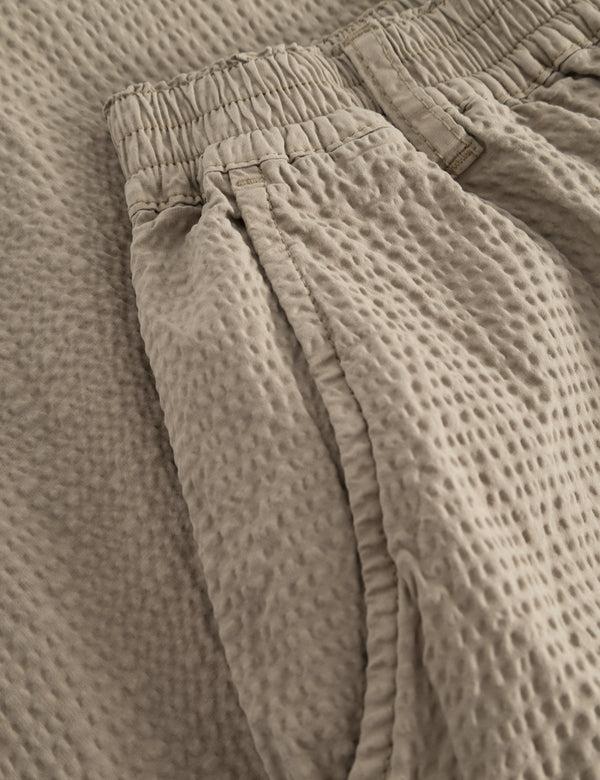 Forét CLAY SEERSUCKER PANTS - TAUPE