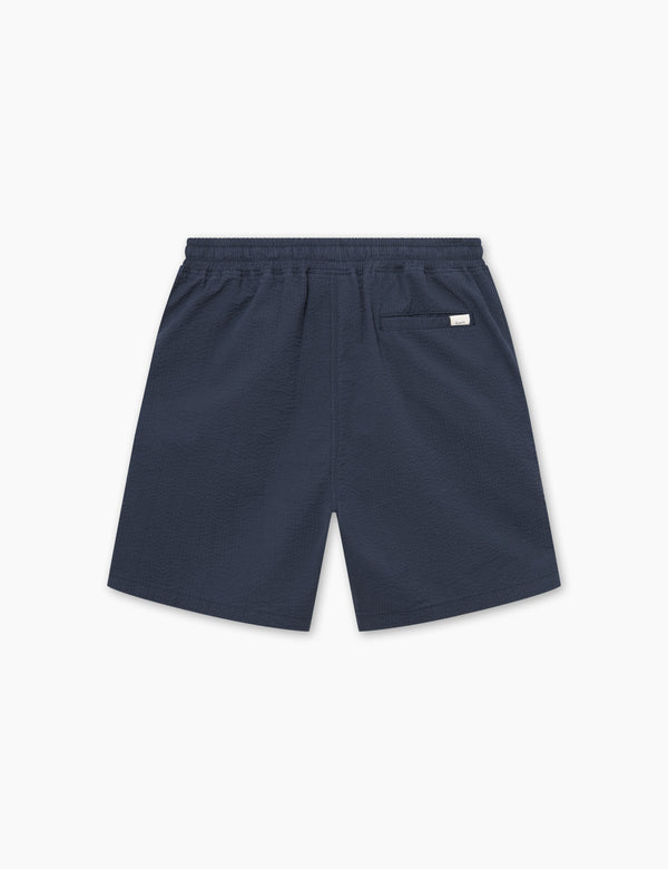 Forét HUSH SEERSUCKER SHORTS - NAVY